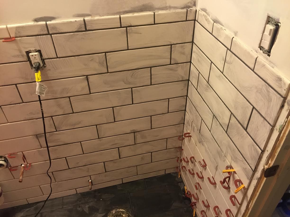 A remodeled bathroom by City Dweller